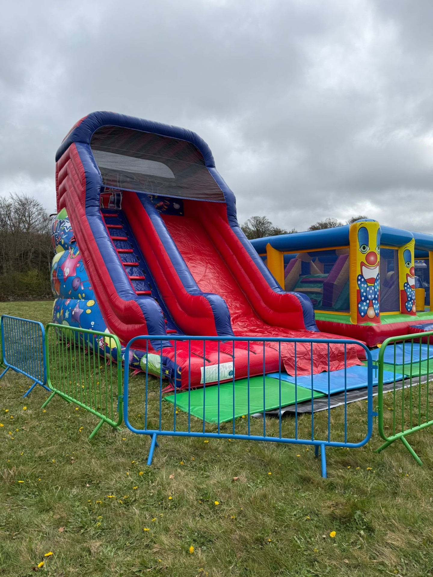 Big slide and fairground rides at a UK funfair